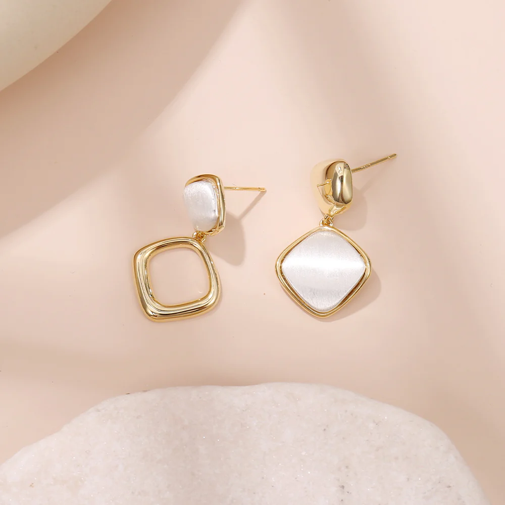 Asymmetrical White Geometric Drop Earrings - Image 2