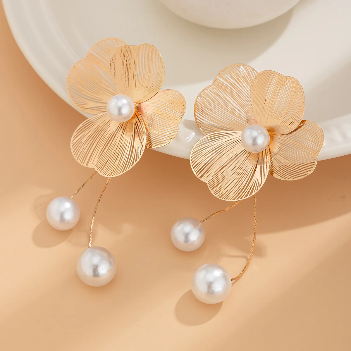 Gold Floral Pearl Drop Earrings - Image 4