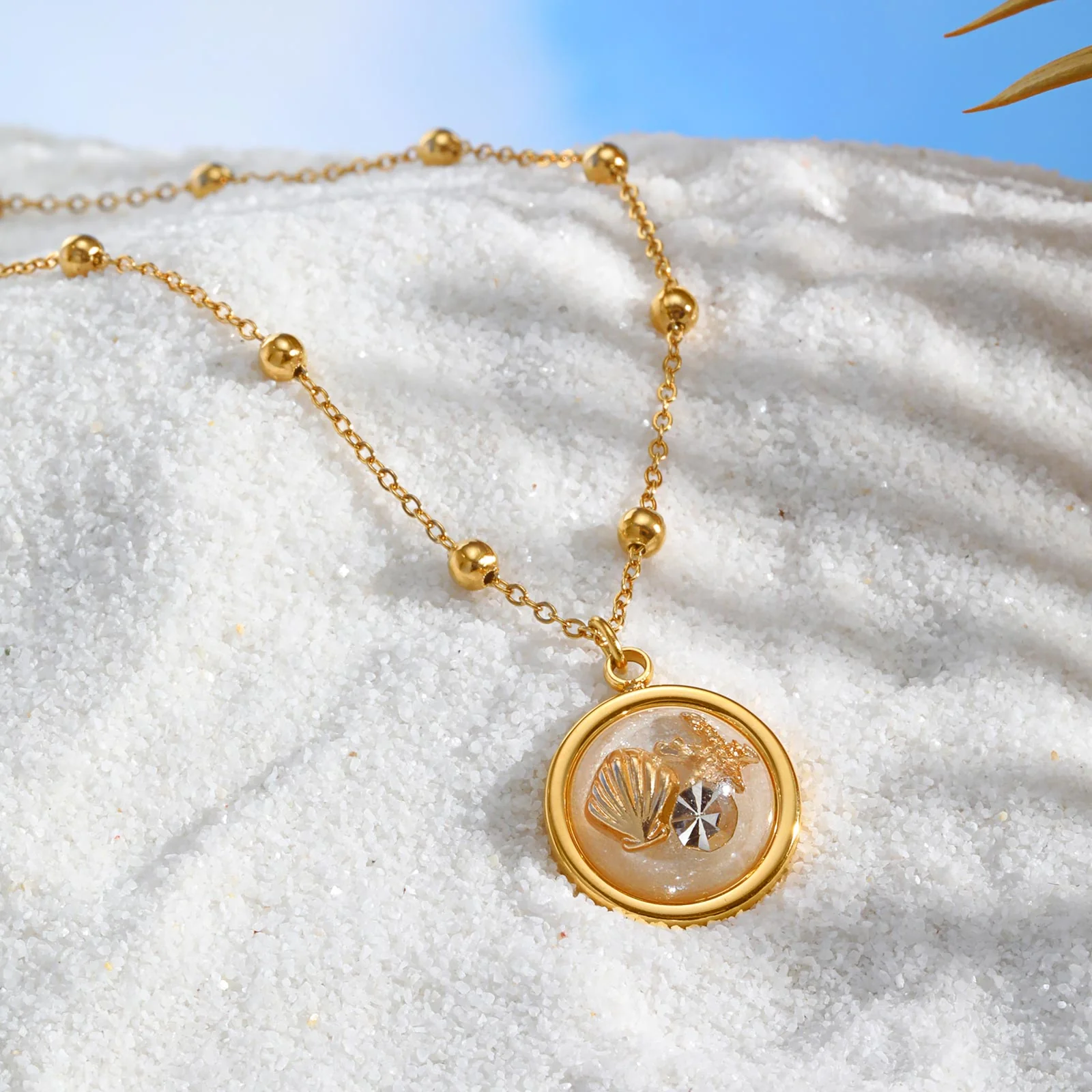 Gold Shell Charm Necklace with Crystal Pendant - Image 3