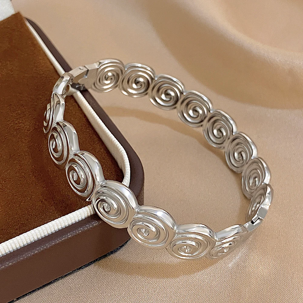 Gold Swirl Pattern Bangle Bracelet - Image 2