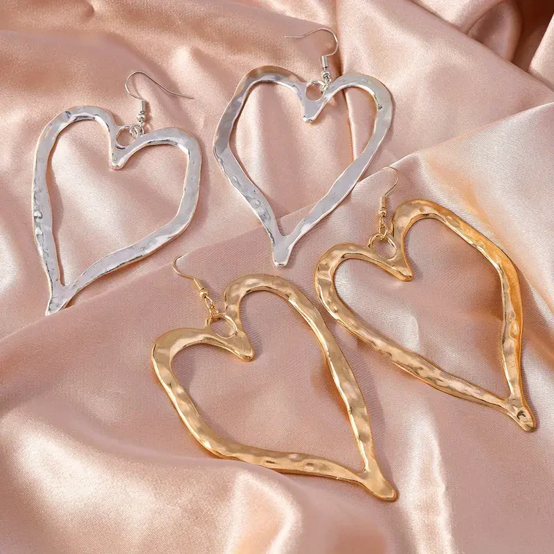 Hollow Heart Shaped Earrings - Image 4