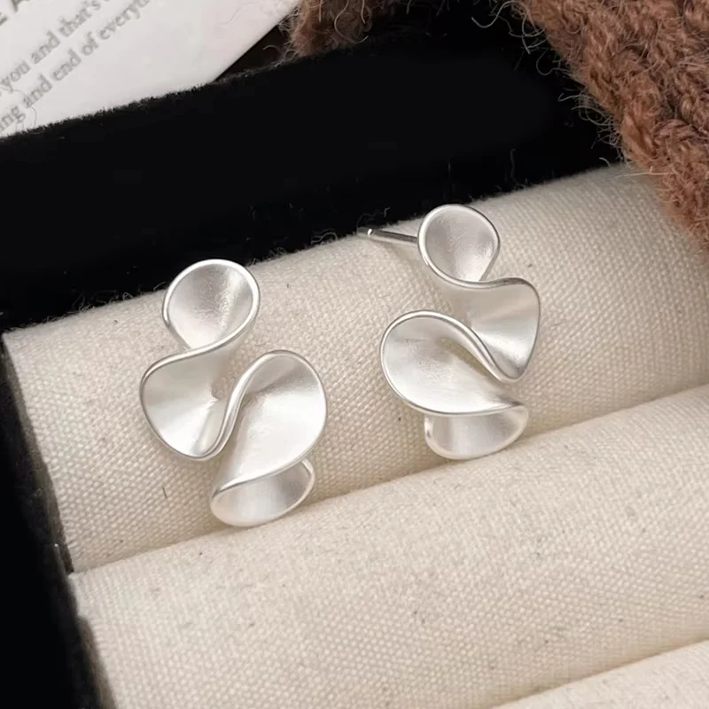 Matte Gold Abstract Twist Earrings - Image 3