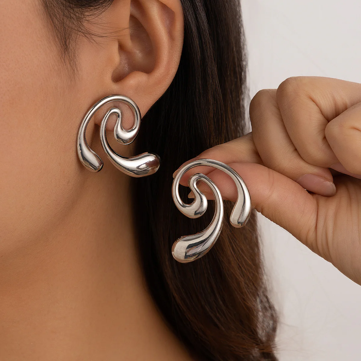 Flowform Gold Statement Earrings - Image 2